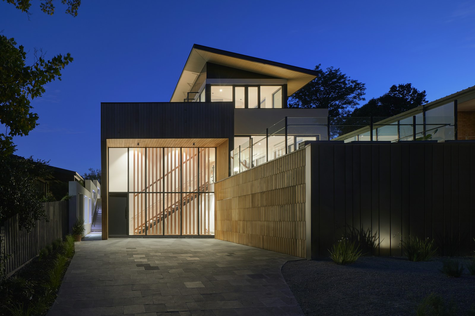 A library with linear shelves and warm tungsten light