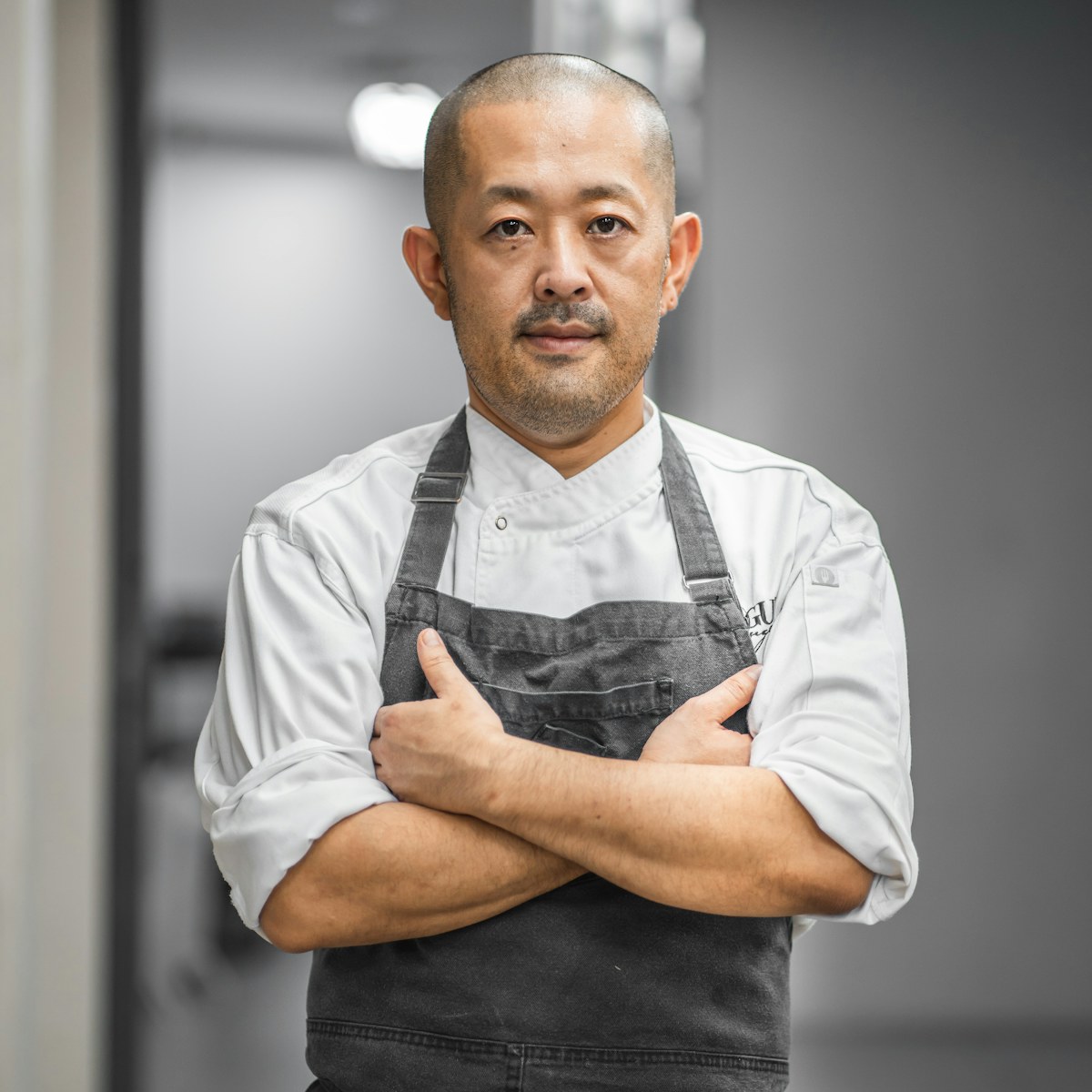 Portrait of chef Mikkel Hald in his kitchen